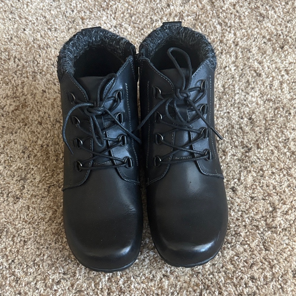 Women’s black zip on boots. NWT